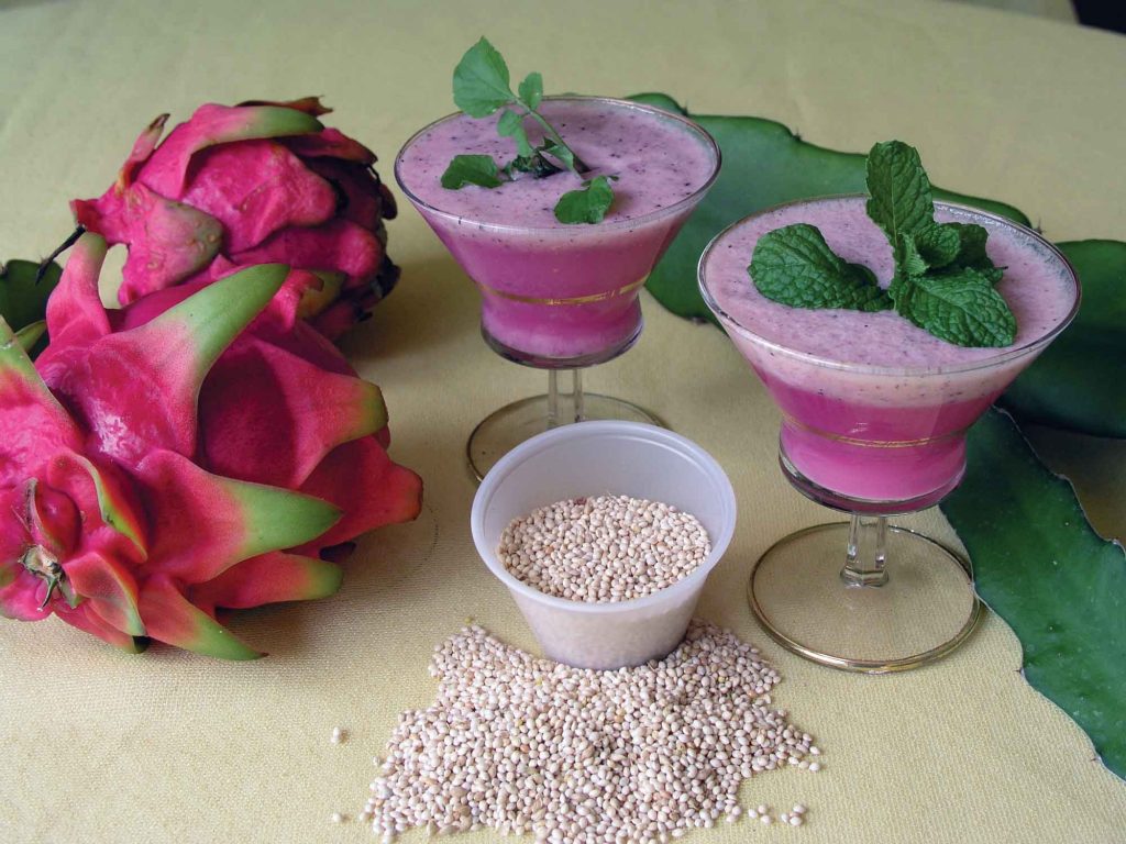 Pink dragon fruit in a smoothie-blended with millet sprouts